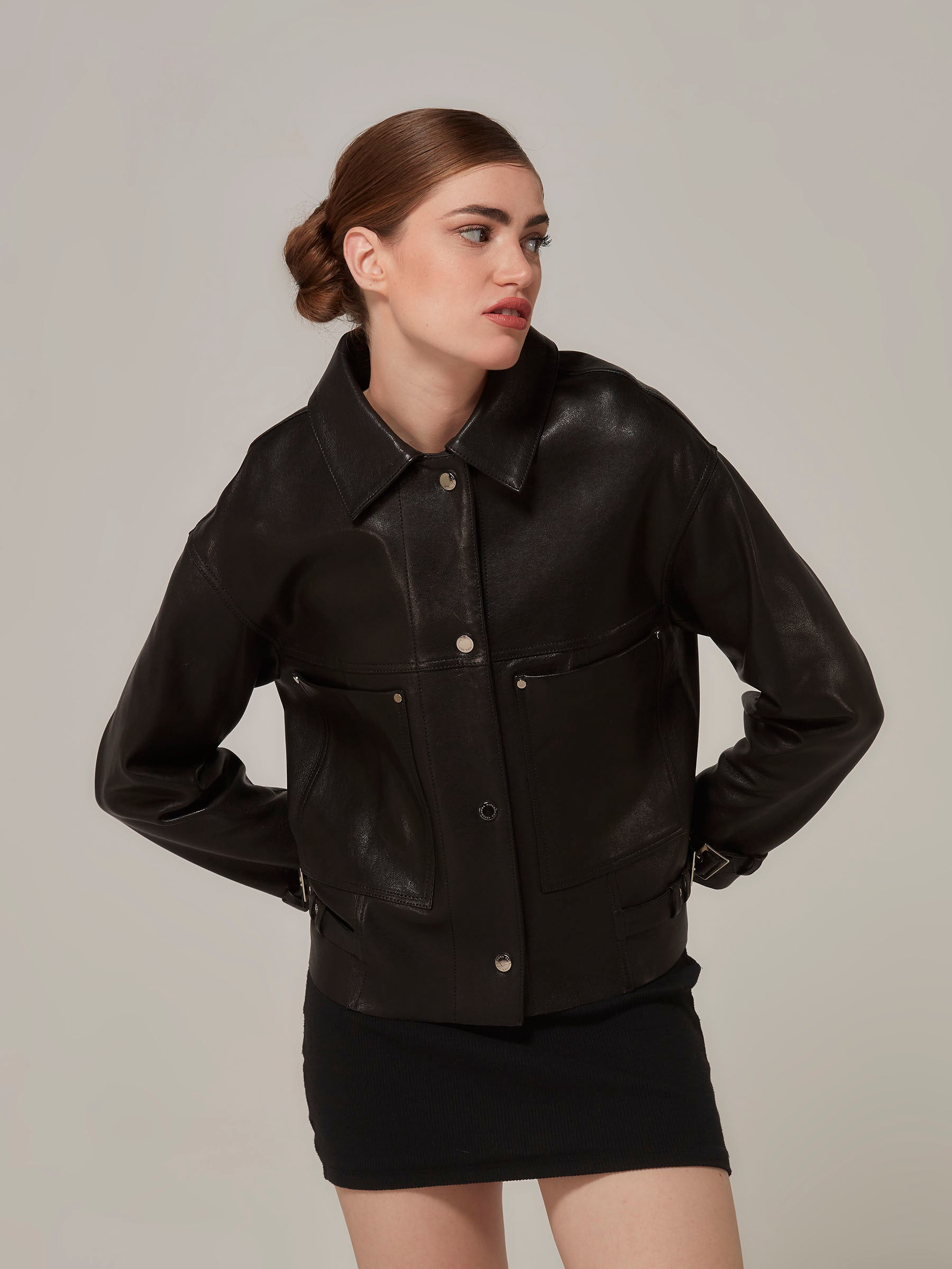 Black Leather Motorcycle Jacket Minimalist Design front pose